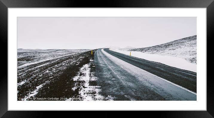 Road trip secondary with snow without anyone driving through Iceland Framed Mounted Print by Joaquin Corbalan