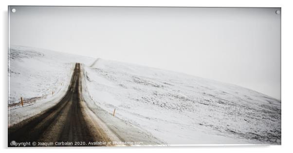 Road trip secondary with snow without anyone driving through Iceland Acrylic by Joaquin Corbalan