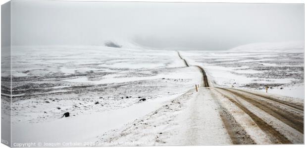 Road trip secondary with snow without anyone driving through Iceland Canvas Print by Joaquin Corbalan