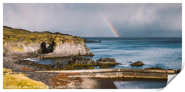 Rainbow over the Icelandic coast in the middle of nature. Print by Joaquin Corbalan