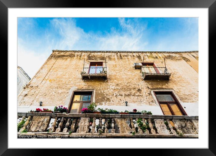 Colorful and old alleys of the touristic Italian city of Bari. Framed Mounted Print by Joaquin Corbalan