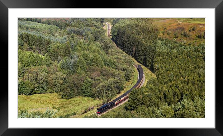 Steam train navigating a valley Framed Mounted Print by Jason Wells