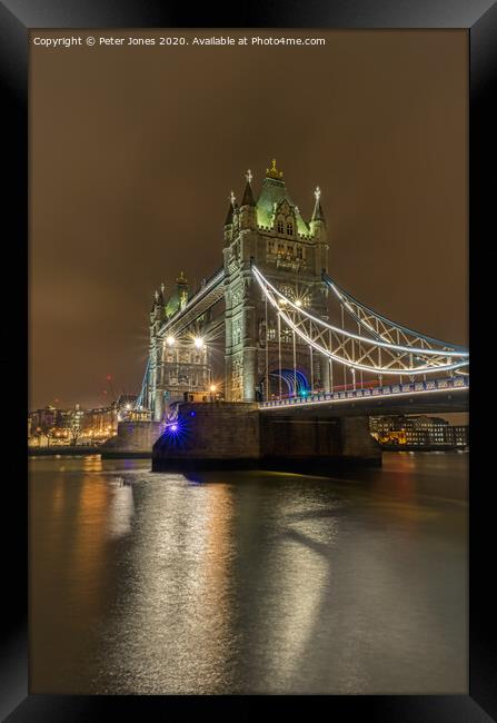 Tower Bridge at night. Framed Print by Peter Jones