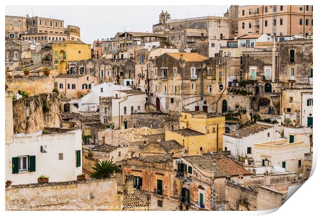 Long panoramic views of the rocky old town of Matera with its stone roofs. Print by Joaquin Corbalan
