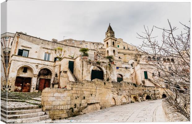 Long panoramic views of the rocky old town of Matera with its stone roofs. Canvas Print by Joaquin Corbalan