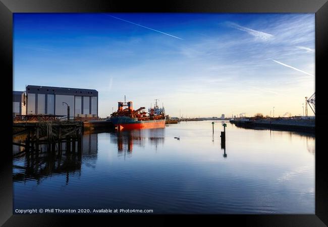 Early morning sunshine over Middlesbrough Docks Framed Print by Phill Thornton