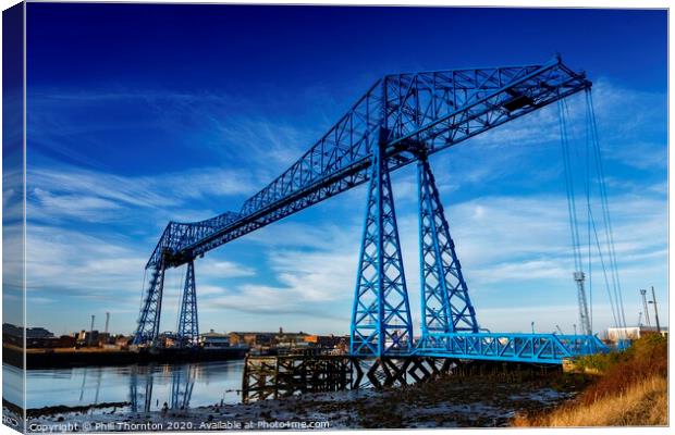 Blue skies above the Tees Transporter bridge. Canvas Print by Phill Thornton