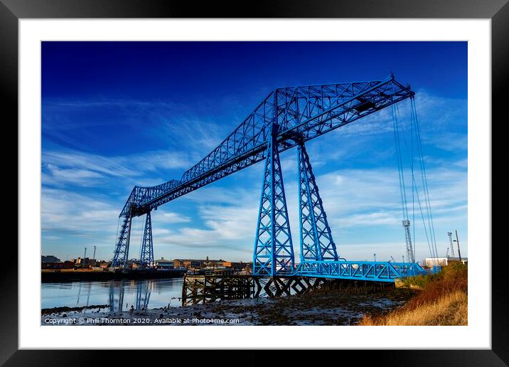 Blue skies above the Tees Transporter bridge. Framed Mounted Print by Phill Thornton