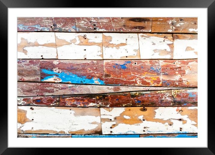 Painted wooden boards of various colors aged, natural texture background. Framed Mounted Print by Joaquin Corbalan