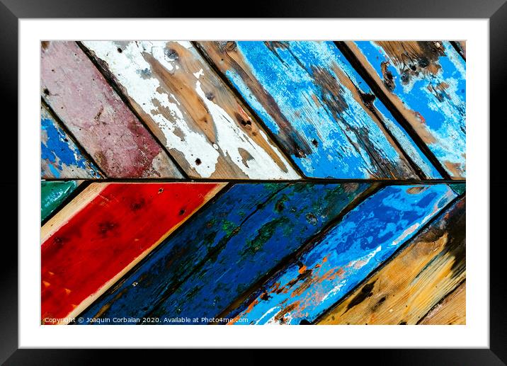 Painted wooden boards of various colors aged, natural texture background. Framed Mounted Print by Joaquin Corbalan