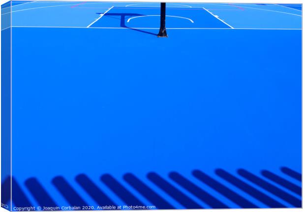 Floor background of an intense blue sports field with white lines. Canvas Print by Joaquin Corbalan