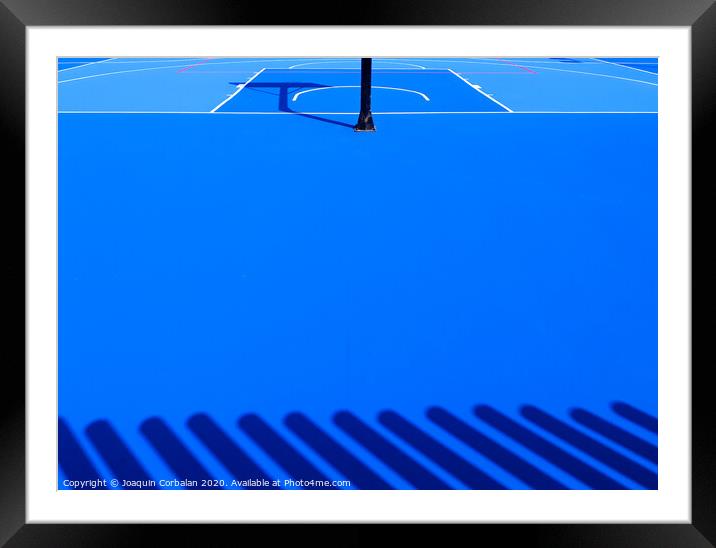 Floor background of an intense blue sports field with white lines. Framed Mounted Print by Joaquin Corbalan