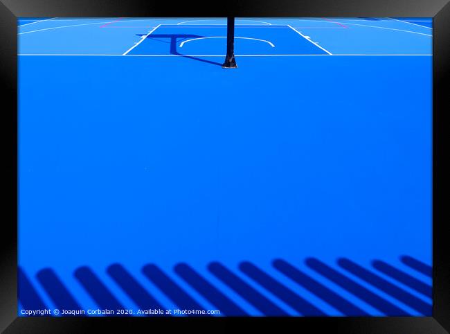 Floor background of an intense blue sports field with white lines. Framed Print by Joaquin Corbalan