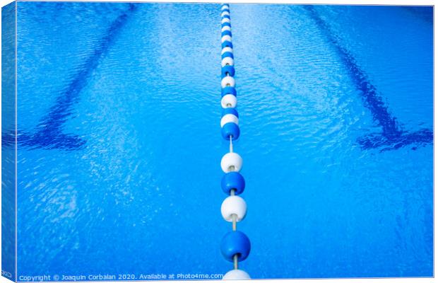 Detail of the water of a pool with beacons to separate the swimming streets. Canvas Print by Joaquin Corbalan