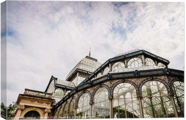 Exterior of the Crystal Palace in Madrid, a must for tourists, in the Retiro Park. Canvas Print by Joaquin Corbalan