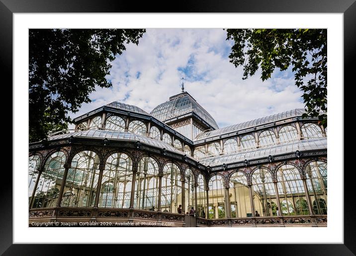 Exterior of the Crystal Palace in Madrid, a must for tourists, in the Retiro Park. Framed Mounted Print by Joaquin Corbalan