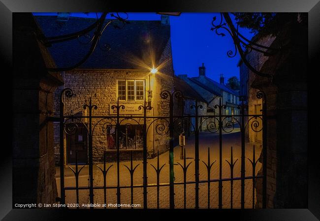 Lamplight in Stow on the Wold  Framed Print by Ian Stone