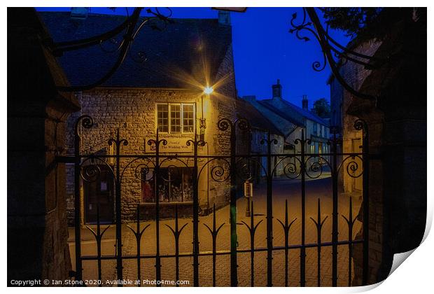 Lamplight in Stow on the Wold  Print by Ian Stone