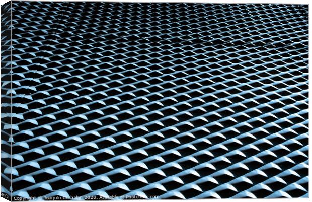 Industrial background with metallic texture illuminated with strong light and intense shadows and repetitive pattern. Canvas Print by Joaquin Corbalan