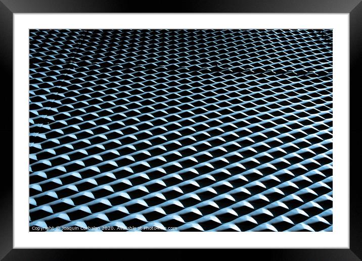 Industrial background with metallic texture illuminated with strong light and intense shadows and repetitive pattern. Framed Mounted Print by Joaquin Corbalan