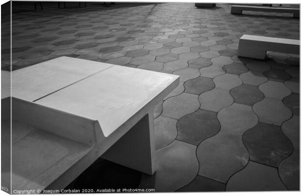 Simple urban architecture elements and tiled floor in a park, in black and white. Canvas Print by Joaquin Corbalan