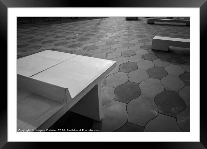 Simple urban architecture elements and tiled floor in a park, in black and white. Framed Mounted Print by Joaquin Corbalan