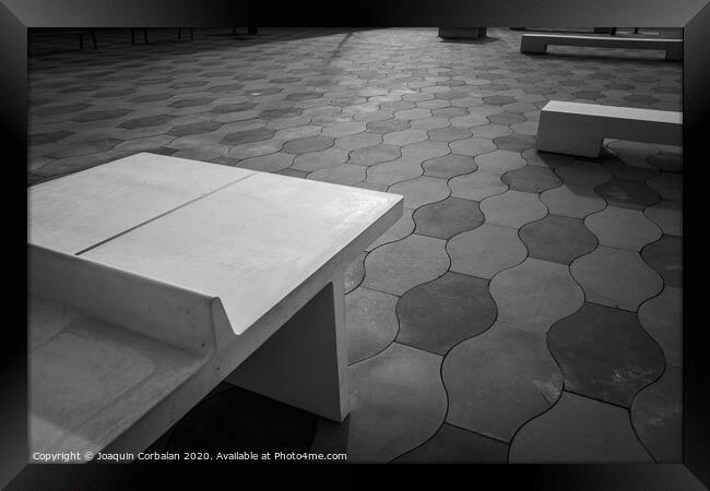 Simple urban architecture elements and tiled floor in a park, in black and white. Framed Print by Joaquin Corbalan