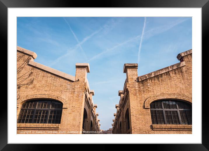 Old brick industrial buildings renovated for social uses of the city in Valencia, Spain. Framed Mounted Print by Joaquin Corbalan