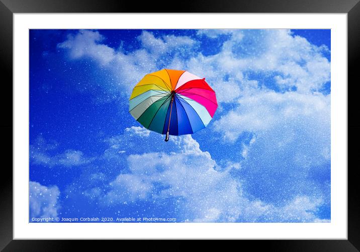 Multicolored umbrella flying suspended over bright blue sky background , with copy space. Framed Mounted Print by Joaquin Corbalan