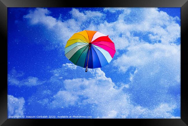 Multicolored umbrella flying suspended over bright blue sky background , with copy space. Framed Print by Joaquin Corbalan