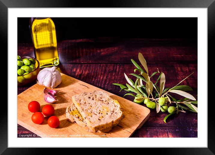 Healthy breakfast based on bread and olive oil. Framed Mounted Print by Joaquin Corbalan