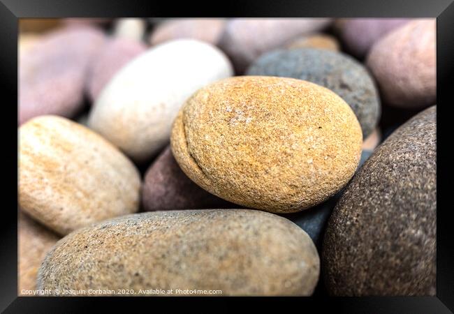 Natural background composed of pebbles and small rocks. Framed Print by Joaquin Corbalan