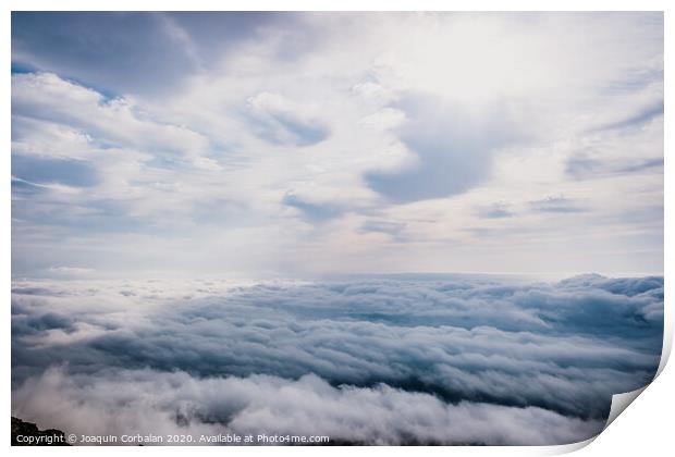 Awesome view on top of the clouds on a cloudy morning. Print by Joaquin Corbalan