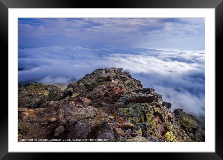 Peñalara Peak, in the Sierra de Guadarrama, seen from the cliff of birds and carnations, a day of clouds. Framed Mounted Print by Joaquin Corbalan