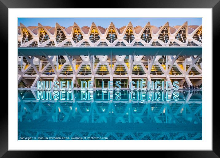 Museum of the sciences of the city, with luminous letters reflected in the lake. Framed Mounted Print by Joaquin Corbalan