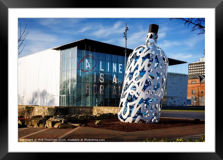 Bottle O' Noters sculpture in Middlesbrough. Framed Mounted Print by Phill Thornton