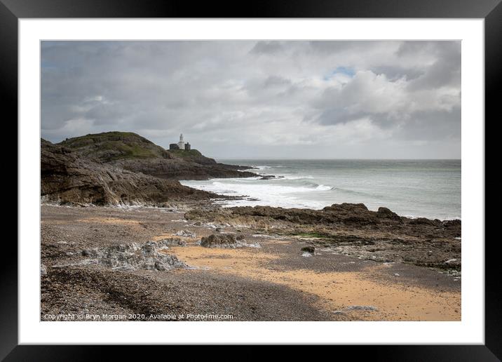 Mumbles lighthouse from Bracelet bay Framed Mounted Print by Bryn Morgan