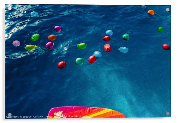 Group of many colorful plastic water balloons floating in the water of a pool to entertain their children on summer vacations. Acrylic by Joaquin Corbalan