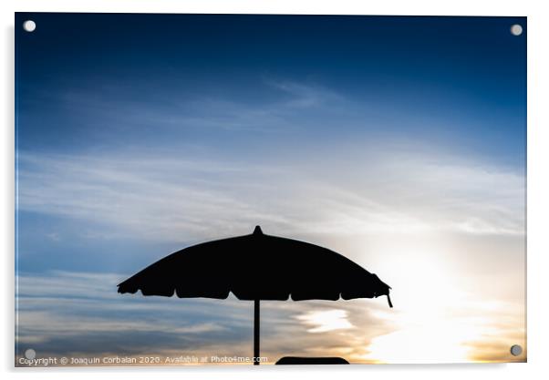 Silhouette of beach umbrella against backlight on a hot summer day. Acrylic by Joaquin Corbalan