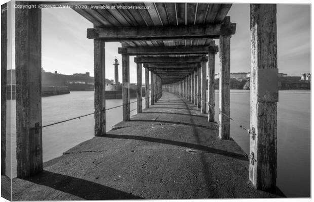 Under the West pier Canvas Print by Kevin Winter
