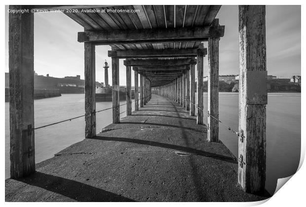 Under the West pier Print by Kevin Winter