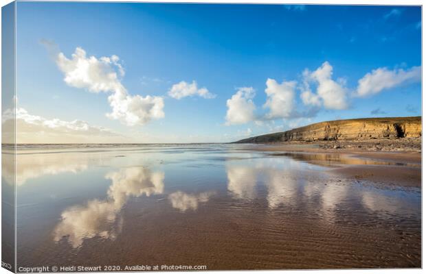 Dunraven Bay Reflections Canvas Print by Heidi Stewart