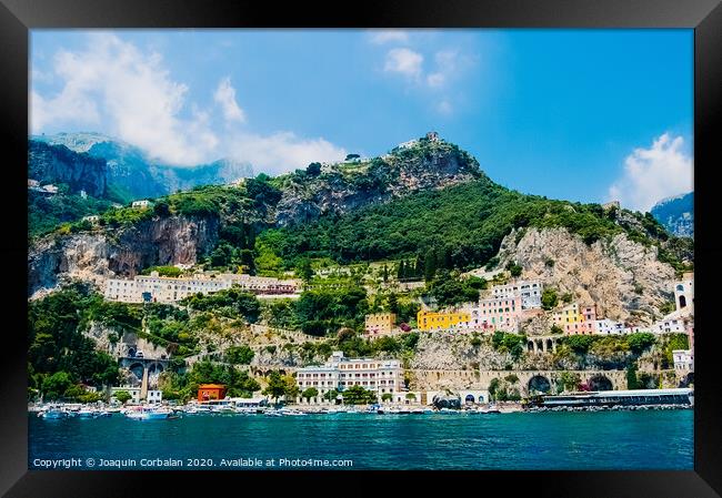 View from the sea of this picturesque Italian Mediterranean city, with old and colorful houses built on the side of a hill. Framed Print by Joaquin Corbalan