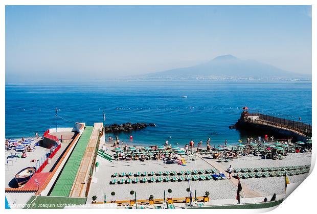  A beach with sunbathers in Sorrento, with background of unfocused view of Vesuvius volcano. Print by Joaquin Corbalan