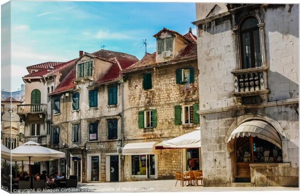 Old town of Split, medieval city with streets full of tourists and religious buildings. Canvas Print by Joaquin Corbalan