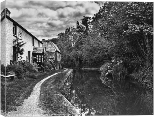 Canalside Cottages At Talybont Canvas Print by Ian Lewis