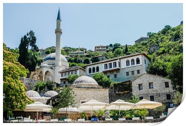 View of the main mosque of the city, in the sun next to a bar where you can have a drink. Print by Joaquin Corbalan