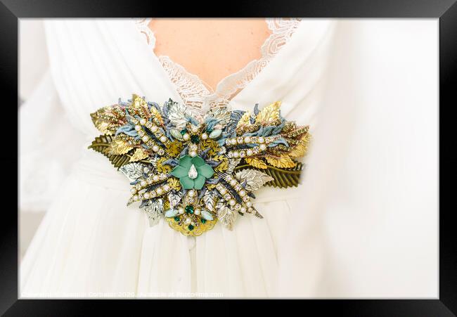 Flower shaped brooch made with small gemstones for a wedding dress. Framed Print by Joaquin Corbalan