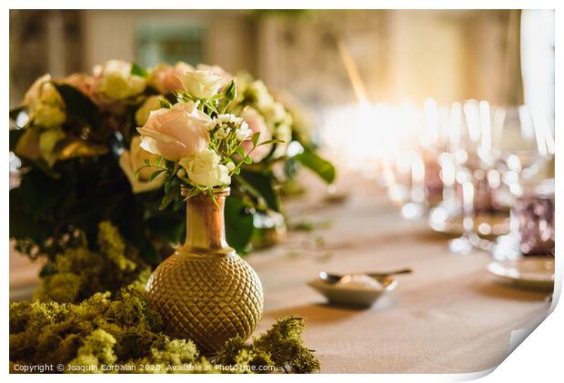 Beautiful vintage vases with roses as centerpieces of decorating tables of a wedding. Print by Joaquin Corbalan