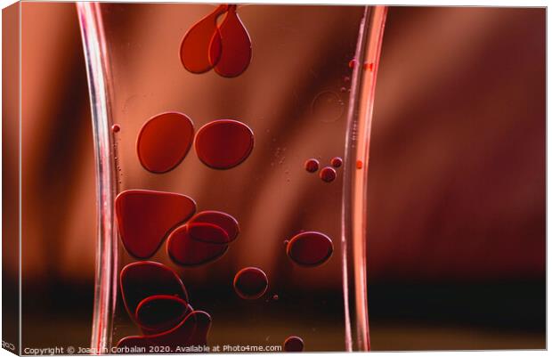 Red drops similar to blood falling in water. Canvas Print by Joaquin Corbalan
